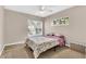 Inviting bedroom with natural light, a ceiling fan, and a window at 4356 S Kirkman Rd # 514, Orlando, FL 32811