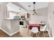 Bright eat-in kitchen with modern appliances, light wood cabinets, and a breakfast bar at 4356 S Kirkman Rd # 514, Orlando, FL 32811