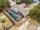 Aerial view of home showcasing the screened-in pool and well-maintained fenced yard at 4523 Wyndcliff Cir, Orlando, FL 32817