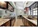 Modern kitchen featuring stainless steel appliances and granite countertops at 4523 Wyndcliff Cir, Orlando, FL 32817