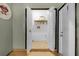 This is the laundry room, featuring tile floor, shelving, and washer/dryer hookups at 4523 Wyndcliff Cir, Orlando, FL 32817