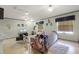 Inviting living room with comfortable seating and natural light from the windows at 4523 Wyndcliff Cir, Orlando, FL 32817