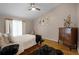 Comfortable main bedroom with a ceiling fan and natural light from the windows at 4523 Wyndcliff Cir, Orlando, FL 32817