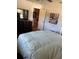 Spacious bedroom with a dresser, TV, and neutral tones create a relaxing atmosphere at 4805 Sw 171St Ct, Dunnellon, FL 34432