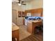 Functional kitchen with wooden cabinets, a breakfast bar, and modern appliances for easy meal preparation at 4805 Sw 171St Ct, Dunnellon, FL 34432