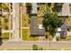 Aerial view of property showcasing the roof, lawn, landscaping, street, and nearby houses at 500 Vereen Dr, Maitland, FL 32751