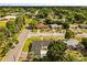 High angle aerial view of property showcasing lawn, trees, neighborhood, and roadways at 500 Vereen Dr, Maitland, FL 32751