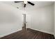 This bedroom features sleek wood flooring, and a closet for storage at 500 Vereen Dr, Maitland, FL 32751