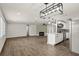 Open concept living space featuring a kitchen island and living room at 500 Vereen Dr, Maitland, FL 32751