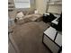 Functional room with sofa, carpet, shelving, desk and chair at 603 Zinnia Dr, Casselberry, FL 32707