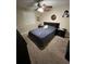 Bedroom featuring carpet flooring, dark wood furniture, and neutral walls at 603 Zinnia Dr, Casselberry, FL 32707