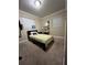 Cozy bedroom with carpet, a window, and simple decor, creating a peaceful retreat at 603 Zinnia Dr, Casselberry, FL 32707
