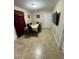 Bright dining room with tile flooring and table with seating for six at 603 Zinnia Dr, Casselberry, FL 32707