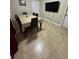 Bright dining room with tile flooring and table with seating for six at 603 Zinnia Dr, Casselberry, FL 32707