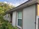 Exterior view of home showing windows and landscaping at 603 Zinnia Dr, Casselberry, FL 32707