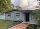 Charming single-story home with brick walkway and neutral exterior paint at 603 Zinnia Dr, Casselberry, FL 32707