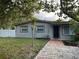 Charming single-story home with brick walkway and neutral exterior paint at 603 Zinnia Dr, Casselberry, FL 32707