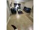 Inviting living room with tile flooring, blue sofas, and natural light at 603 Zinnia Dr, Casselberry, FL 32707