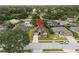 Aerial view of a home in a neighborhood with mature trees at 813 Lancer Cir, Ocoee, FL 34761