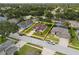 House in neighborhood with nicely landscaped yard and mature trees at 813 Lancer Cir, Ocoee, FL 34761
