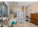 Bathroom with garden tub, walk-in shower and neutral color palette at 813 Lancer Cir, Ocoee, FL 34761