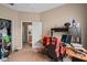 Bedroom with a glimpse into the bathroom, a closet and desk at 813 Lancer Cir, Ocoee, FL 34761