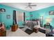 Bright bedroom with a ceiling fan and a window for natural light at 813 Lancer Cir, Ocoee, FL 34761