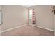 A cozy bedroom with a window featuring floral curtains at 813 Lancer Cir, Ocoee, FL 34761