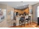Bright eat-in kitchen with breakfast bar and plenty of cabinet space at 813 Lancer Cir, Ocoee, FL 34761