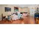 Living room featuring hardwood floors with an archway to front door at 813 Lancer Cir, Ocoee, FL 34761