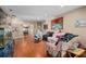 Open living room with hardwood floors and an open archway to the dining room at 813 Lancer Cir, Ocoee, FL 34761