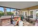 Screened-in lanai features hot tub and access to the backyard at 813 Lancer Cir, Ocoee, FL 34761