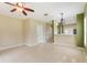 Spacious living area with tile flooring, neutral walls, and an open layout, perfect for relaxing or entertaining guests at 9492 Flowering Cottonwood Rd # 82, Orlando, FL 32832