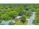 Scenic aerial view of the home, displaying mature trees and well-maintained surroundings at 102 Mayrose Dr, Sanford, FL 32771