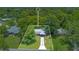 Aerial view with a defined property outline showing the home and its surrounding landscape at 102 Mayrose Dr, Sanford, FL 32771