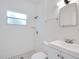 Bathroom features a shower, vanity, and patterned tile at 102 Mayrose Dr, Sanford, FL 32771