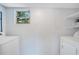 Laundry area in the basement of the home at 102 Mayrose Dr, Sanford, FL 32771