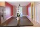 Open-concept living area with ceiling fan and sliding glass doors to the backyard at 12630 Old Plantation Ln, Orlando, FL 32824