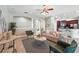 Inviting living room featuring stylish furniture, a modern rug, and an open layout at 13943 Caywood Pond Dr, Windermere, FL 34786