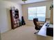 Bright office space with large window, perfect for a productive work-from-home setup at 1425 Hollyberry Pl, The Villages, FL 32162