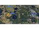 Aerial view showing proximity to Disney Theme Park, schools, golf, and local amenities at 15071 Guava Bay Dr, Winter Garden, FL 34787