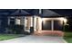 Charming home exterior with well-manicured landscaping and a three-car garage at 15071 Guava Bay Dr, Winter Garden, FL 34787