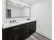 Bathroom features a double sink vanity with modern fixtures and ample counter space at 18015 Beach St, Umatilla, FL 32784