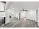 Open-concept floorplan with updated flooring, fresh paint, and modern lighting at 18015 Beach St, Umatilla, FL 32784