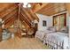 Charming bedroom featuring wood accents, a vaulted ceiling, and twin beds with floral comforters at 187 N Samsula Dr, New Smyrna Beach, FL 32168
