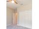 Bedroom with double door closet and ceiling fan at 1889 15Th St, Orange City, FL 32763