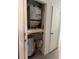 A utility closet contains a water heater and HVAC system within a home at 199 Afton Sq # 108, Altamonte Springs, FL 32714