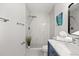 Modern bathroom featuring a walk-in shower, designer accents and plenty of natural light at 2089 Sunderland Rd, Maitland, FL 32751