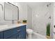 Updated bathroom featuring a walk-in shower, modern fixtures, and vanity at 2089 Sunderland Rd, Maitland, FL 32751