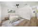 Comfortable bedroom with closet, ceiling fan and lots of natural light at 2089 Sunderland Rd, Maitland, FL 32751